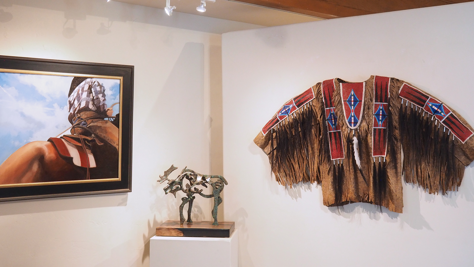 Peggy Judy western painting and Janet Nelson native american sculpture