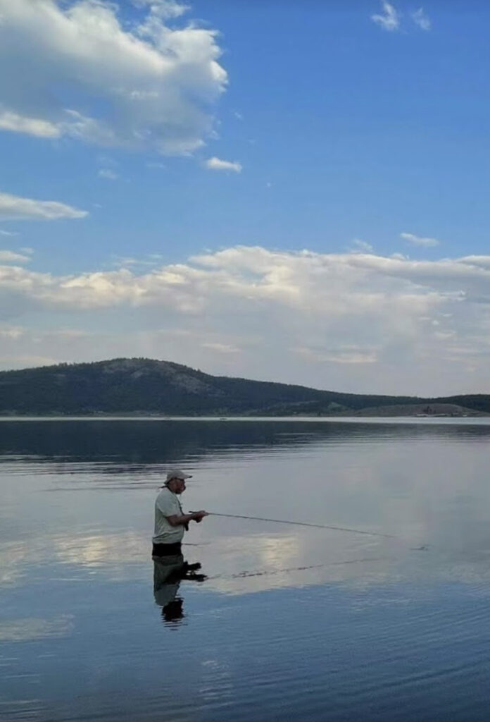 Michael Kessler fishing in lake