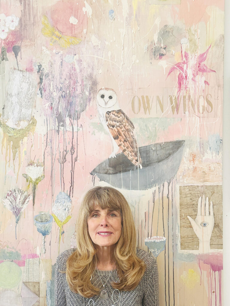 ALexandra Eldridge portrait with "Own Wings" in the background